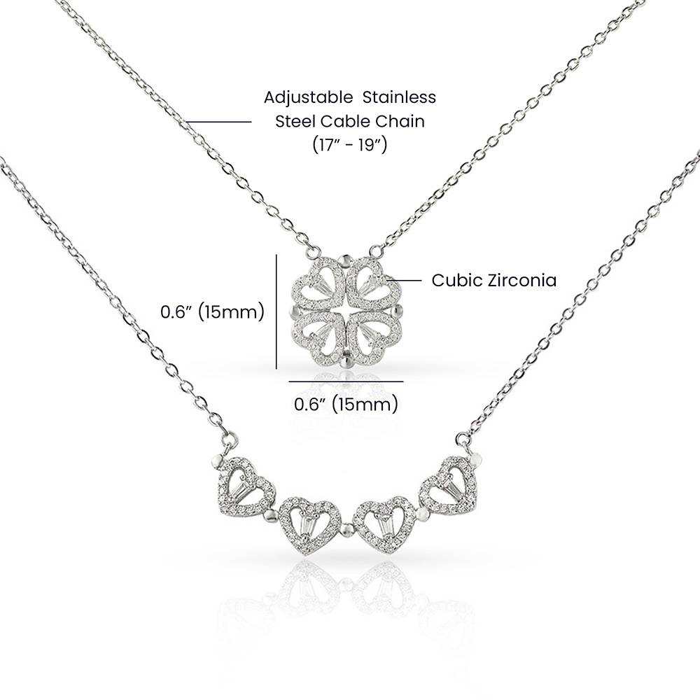 Magnetic Hearts Clover Necklace with crystal four-heart pendant in white gold finish on adjustable stainless steel chain