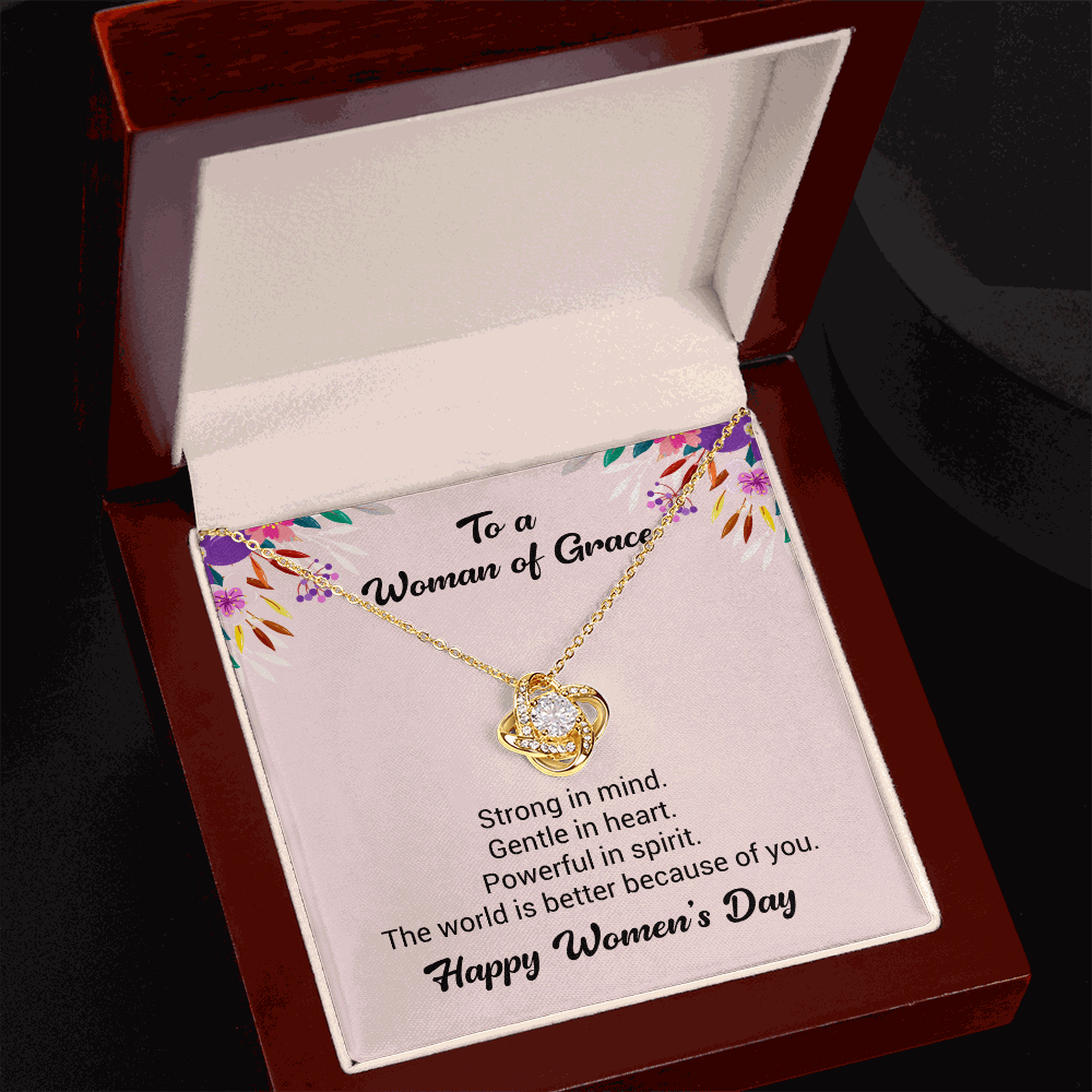 14k white gold Love Knot Necklace pendant with sparkling cubic zirconia on adjustable chain